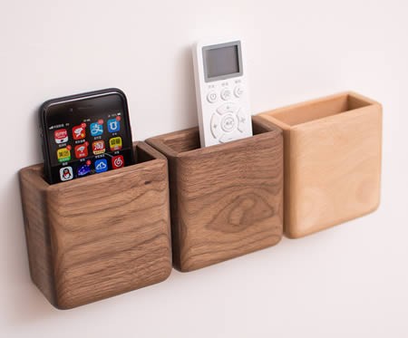 Creative wooden wall-mounted remote control phone storage box