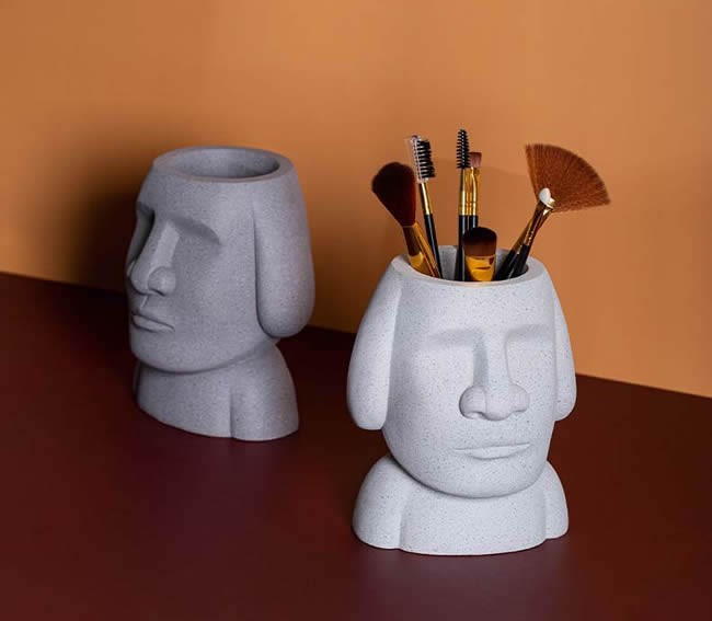 Abstract Easter Island Stone Man Organizes Storage Pen Holder