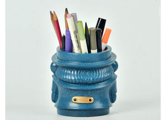 Creative beard man with cigarette in its mouth organize pen holder
