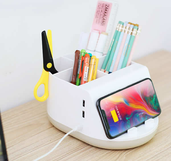 Creative remote control storage box mobile phone wireless charging