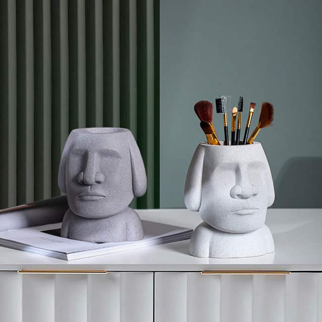 Abstract Easter Island Stone Man Organizes Storage Pen Holder