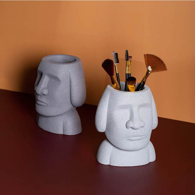 Abstract Easter Island Stone Man Organizes Storage Pen Holder