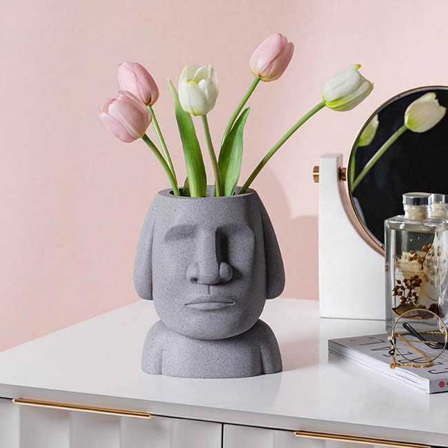 Abstract Easter Island Stone Man Organizes Storage Pen Holder